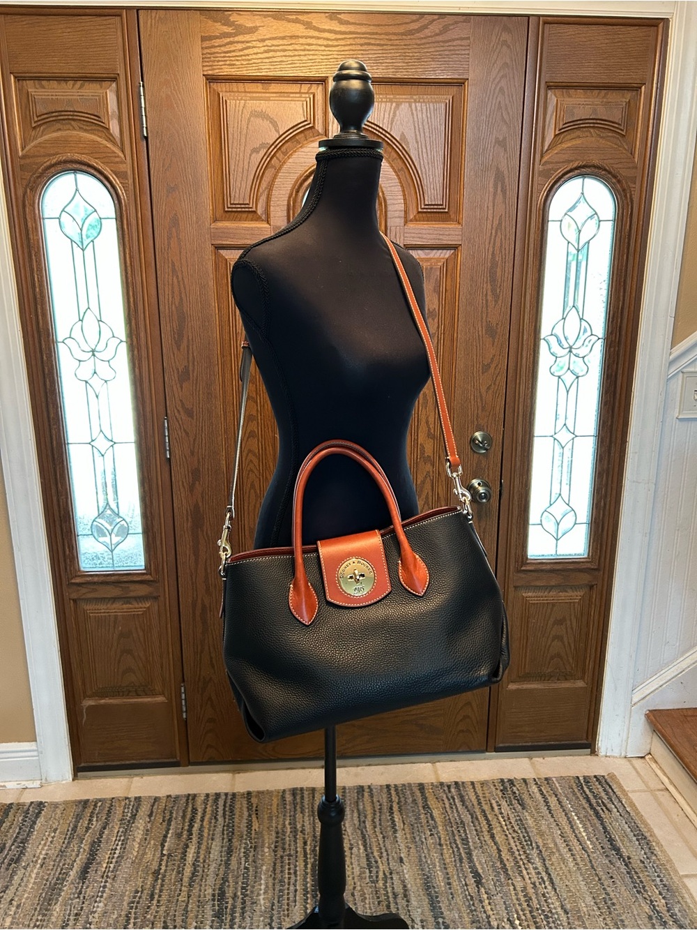 Dooney & Bourke Black Tote 30 with Brown Trim and Gold Hardware